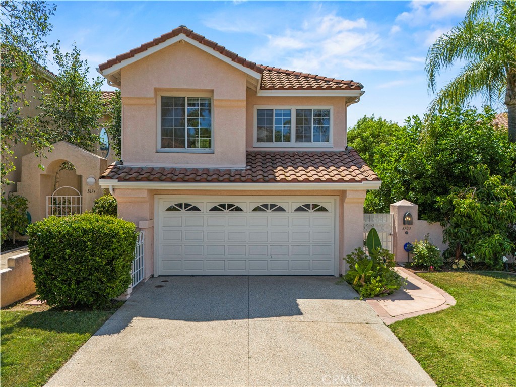 Located in the prestigious guard-gated community of Calabasas Park Estates, this 3-bedroom, 2.5-bathroom home offers 1,581 square feet of comfortable living space and sweeping views that set the tone for tranquil everyday living. The light-filled interior features new luxury vinyl floors, high ceilings, generous windows, and an easy flow between living and dining areas—ideal for both relaxing and entertaining. Upstairs, the primary suite serves as a peaceful retreat with expansive views and a spacious en-suite bath. Enjoy the privacy, security, and natural beauty of one of Calabasas' most sought-after neighborhoods, just minutes from The Commons, top-rated schools, and scenic hiking trails. A wonderful opportunity to experience the Calabasas lifestyle.