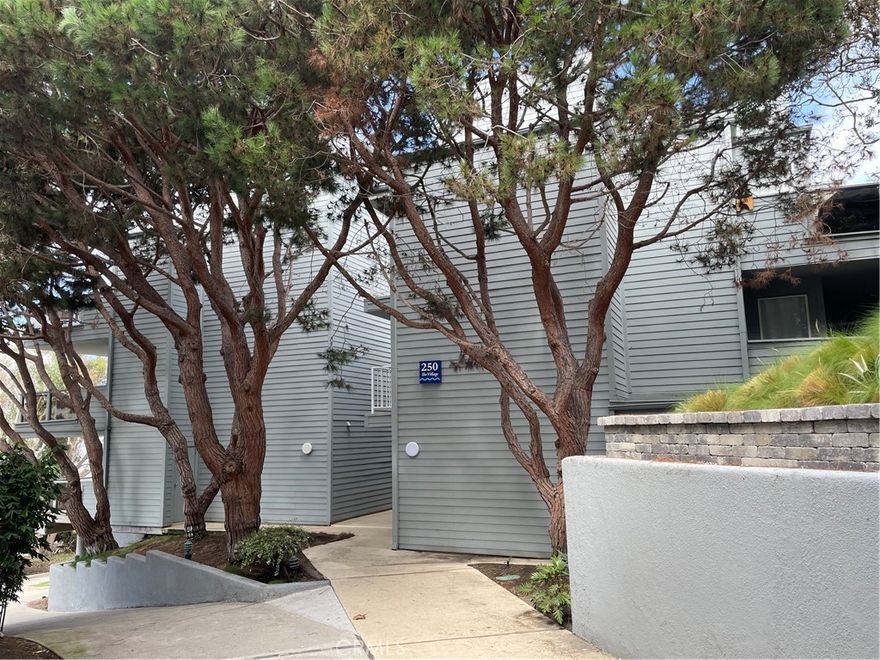 Welcome to this sun-drenched unit that offers a truly spectacular ocean view.  It is a corner unit located on the first floor in the Seascape One complex.  You will enjoy a spacious, open living room with atrium windows and sliding glass doors leading out to the large corner balcony. The interior has beautiful maple finish cabinets, granite countertops, and kitchen bar with all stainless appliances.  Additional features include light oak finish Pergo flooring, crown molding and recessed lighting.  This one-bedroom unit also includes a bonus room that can be used as a second bedroom, den, or office. The bathroom is finished with glass tile insets and granite countertop. One parking space with storage is included.  Just steps away from the laundry room, pool, jacuzzi and beach where you can feel the ocean breeze and enjoy the warmth of the sun.