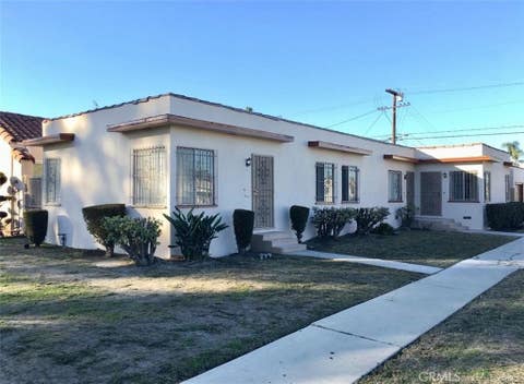 Photo of 1402 W 78th Street, Los Angeles, CA 90047 (MLS # RS26181176)