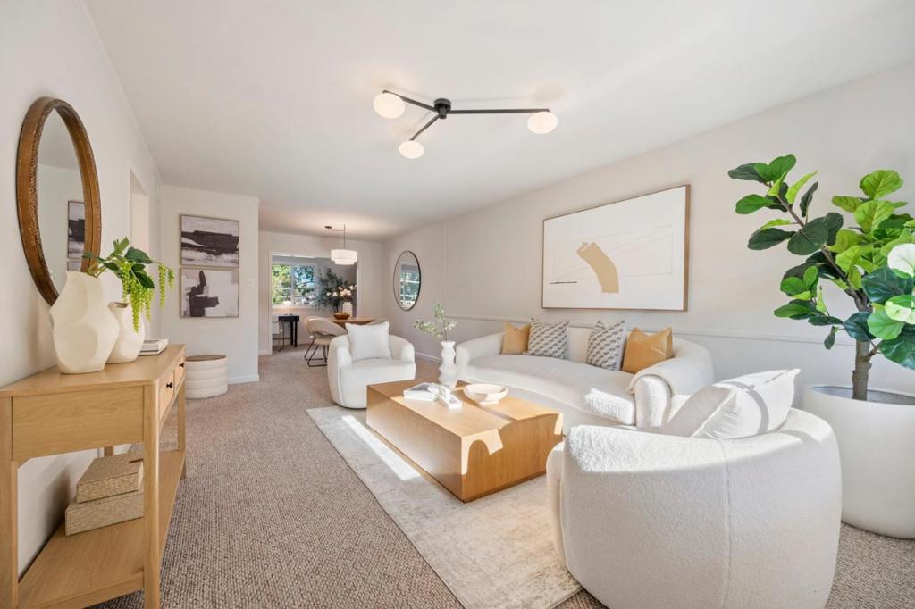 Smart, Stylish, and Centrally Located A Top-Floor Gem. Welcome to 1335 Phelps Ave #8 a recently renewed, top-floor 2BR/1BA condo with an office alcove, extra storage, and abundant natural light. Located in a quiet, well-maintained complex, this 929 sq ft home offers an open, airy layout with a flexible space ideal for a home office or den. The inviting living and dining area flows naturally, making it easy to relax or entertain. Enjoy the peace of no upstairs neighbors, along with a serene community featuring lush landscaping and a sparkling pool. Fresh paint throughout and updated lighting gives this move-in ready condo a clean, modern feel. Ideally situated just off San Tomas Expressway, with fast access to Highways 101 and 280, and moments from Valley Fair, Santana Row, and some of the best shopping and dining in San Jose. Whether you're a first-time buyer, investor, or simply looking for a low-maintenance lifestyle in Silicon Valley, this is a smart and stylish choice. | Freshly Painted with Modern Updates | 2 Bedrooms | 1 Bathrooms | 929 +/- SQ FT | Stainless Steel Appliances | Den/Home Office Area | Stone Countertops | Centralized Heating | 1 Covered Assigned Parking Spot | Extra Storage | Community Pool | Convenient Location |