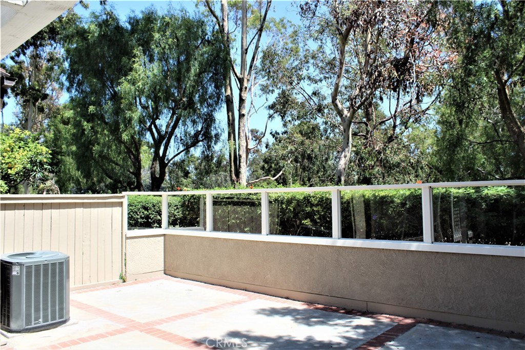 Highly desirable two-story, 2-bedroom Princeton Townhome located within walking distance to UCI and University Shopping Center. Open floor plan with high ceilings, real wood flooring on the main level with upgraded kitchen, and the master bedroom includes a spacious walk-in closet. All bathrooms have been updated with new vanities, framed mirrors, and vessel sinks. Indoor laundry area with washer and dryer included. Private backyard with view of mature landscaping. Attached 1-car garage, 1 carport, and an additional overnight parking permit. The HOA amenities include pools, spas, tennis courts, barbecue areas, and parks. The property is also close to Turtle Rock Elementary, Rancho San Joaquin Middle School, and University High School.