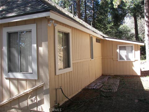 Photo of 21636 Sawpit Canyon Rd, Cedarpines Park, CA 92322 (MLS # IG26048502)