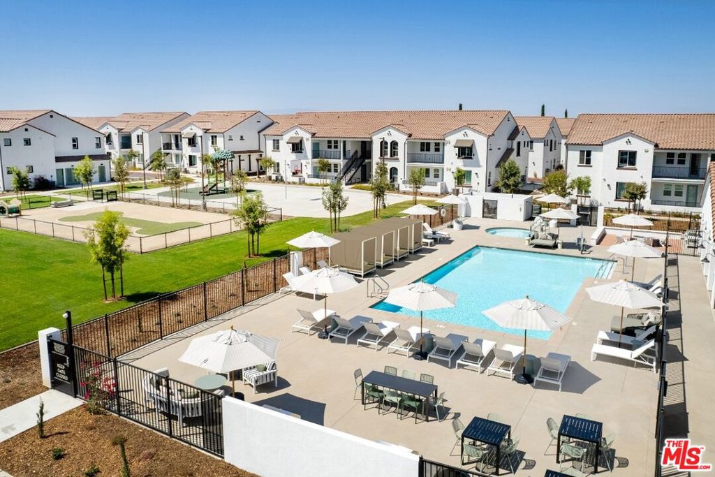 This beautiful 2-bedroom/2-bathroom is available immediately. Experience elevated living with resort-style amenities and designer interiors. Begin in the hotel-inspired lobby with soaring ceilings, a reception desk, and lounge seating. Enjoy a fully equipped fitness center, a catering kitchen with coworking nooks, and an outdoor patio with lounge areas, games, a grill station, firepit, and a pool with cabanas.Inside your home, discover 9' ceilings, large windows, and "wood" vinyl plank flooring. Modern kitchens feature Euro-style cabinetry, quartz countertops, and stainless steel Samsung appliances with gas ranges. Bathrooms offer quartz vanities,, and tubs, while Delta fixtures add a polished touch. Full-size washer/dryers, central heating and air, pet-friendly spaces, private garages, and spacious balconies complete the experience. Photos may consist of similar model units and virtually staged renderings.