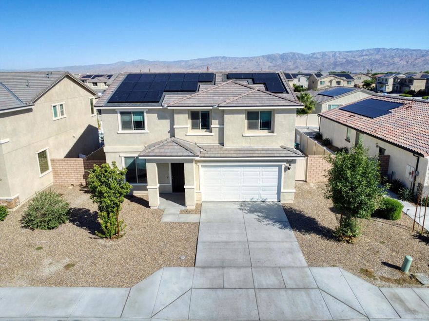 Beautiful 2022 Two-Story Home with Owned Solar. Experience comfort in this beautifully designed two-story home featuring 4 bedrooms, 2.5 bathrooms, and an open-concept floor plan. The main level offers a bright living area, spacious den, and dedicated study space, perfect for working from home or quiet focus. Upstairs, enjoy a large family room, ideal for movie nights or relaxation. The primary suite provides a walk-in closet and ensuite bath. Step outside to a large backyard, ready to be customized with your dream outdoor living area, pool, garden, or your dream outdoor oasis. Energy-efficient living is made easy with an owned solar system, two-car garage and the quality of a 2022 build. Flexible spaces, and sustainable features make this home a standout choice!