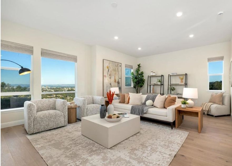 Blow your breath away with this Stunning 2,562SF, 2024 built 4BD/3.5BTH corner single family detached home with amazing VIEWS in a pristine new development. First resale in the most sought after location in the community w/ builder & owner upgrades. Plan 1 layout, filled with natural light, this home offers a thoughtful layout w/ a main-level guest en-suite, attached 2-car garage w/ EV 240V charging & premium flooring. Bonus side yard provides a perfect space for outdoor enjoyment. Gourmet kitchen is a showpiece with high-end Stainless Steel appliances, quartzite counters & large center island ideal for everyday meals & gatherings.  A dedicated office area supports todays hybrid lifestyle, while the living/dining combo has incredible views from the picturesque windows. The primary suite is a peaceful retreat w/ an en-suite bath & two additional bdrms that provide comfort & privacy. Showstopping rooftop deck w/ glass enclosure ideal for year-round outdoor living, dining & taking in the skyline making this 6 month new property one of the standout homes in the area. Upgrades include hardwood floors, custom remote window coverings, owned solar panels w/ battery backup & enterprise level networking. Peaceful retreat w/ easy access to shopping, restaurants, SF, SV & HWYs 280/101/92.