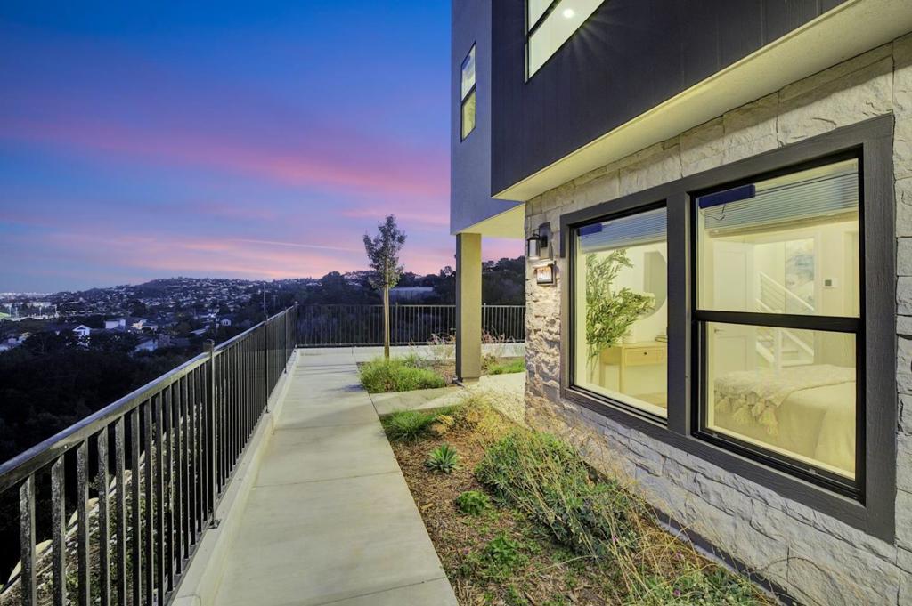 Blow your breath away with this Stunning 2,562SF, 2024 built 4BD/3.5BTH corner single family detached home with amazing VIEWS in a pristine new development. First resale in the most sought after location in the community w/ builder & owner upgrades. Plan A layout, filled with natural light, this home offers a thoughtful layout w/ a main-level guest en-suite, attached 2-car garage w/ EV 240V charging & premium flooring. Bonus side yard provides a perfect space for outdoor enjoyment. Gourmet kitchen is a showpiece with high-end Stainless Steel appliances, quartzite counters & large center island ideal for everyday meals & gatherings. A dedicated office area supports todays hybrid lifestyle, while the living/dining combo has incredible views from the picturesque windows. The primary suite is a peaceful retreat w/ an en-suite bath & two additional bdrms that provide comfort & privacy. Showstopping rooftop deck w/ glass enclosure ideal for year-round outdoor living, dining & taking in the skyline making this 6 month new property one of the standout homes in the area. Upgrades include hardwood floors, custom remote window coverings, owned solar panels w/ battery backup & enterprise level networking. Peaceful retreat w/ easy access to shopping, restaurants, SF, SV & HWYs 280/101/92.