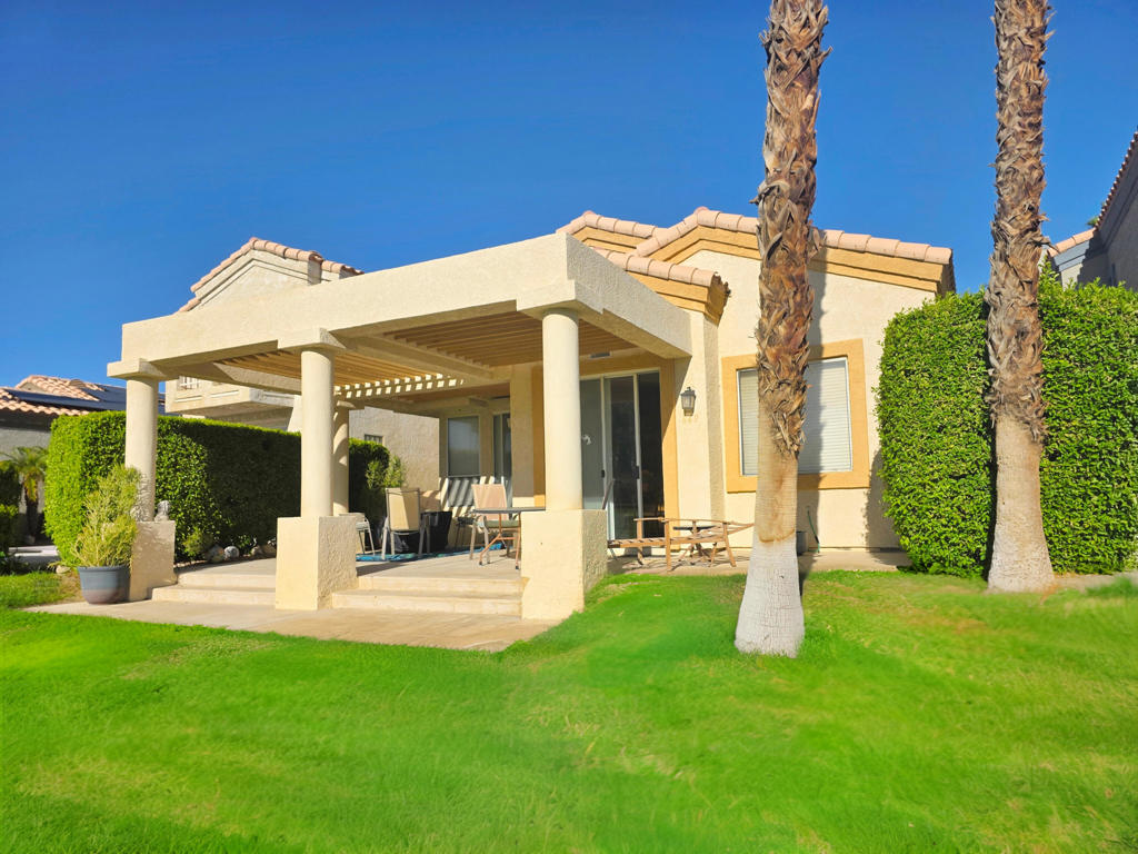 PRICED TO SELL at Desert Princess Country Club! This home shows true pride of ownership, with an open layout that blends comfort and style for everyday living or vacation stays.Golf lovers will enjoy a front-row seat to the fairways, with lush greens and mountain backdrops just outside the door. The highlight of the home is the spacious patio with a custom pergola, perfect for entertaining, relaxing, or enjoying cocktails at sunset.THE SELLER IS CURRENTLY IN THE PROCESS OF EXTENDING THE LAND LEASE, which should be recorded within the next few weeks, once the extension is completed, buyers will be eligible to obtain financing. Making this an even more attractive opportunity.Whether you're looking for a primary residence, a vacation retreat, or an income property, this villa delivers. Desert Princess offers professional on-site rental management, making it simple to generate revenue when you're not here. Even better, the villa is sold fully furnished--move right in and enjoy the lifestyle you deserve.This resort-style community is known for its incredible amenities: 27 holes of championship golf, a country club with dining and bar, spa, tennis, pickleball, and a newly remodeled fitness center. With 35 pools and spas throughout, there's always a place to cool off or unwind.Your HOA dues include Spectrum CATV, high-speed internet with WiFi, and 24-hour gated security, offering both value and peace of mind. Location couldn't be better, just 10 minutes to Downtown Palm Springs.If you've been searching for the perfect combination of LOCATION, VALUE, AND LIFESTYLE, this Desert Princess villa is the one.