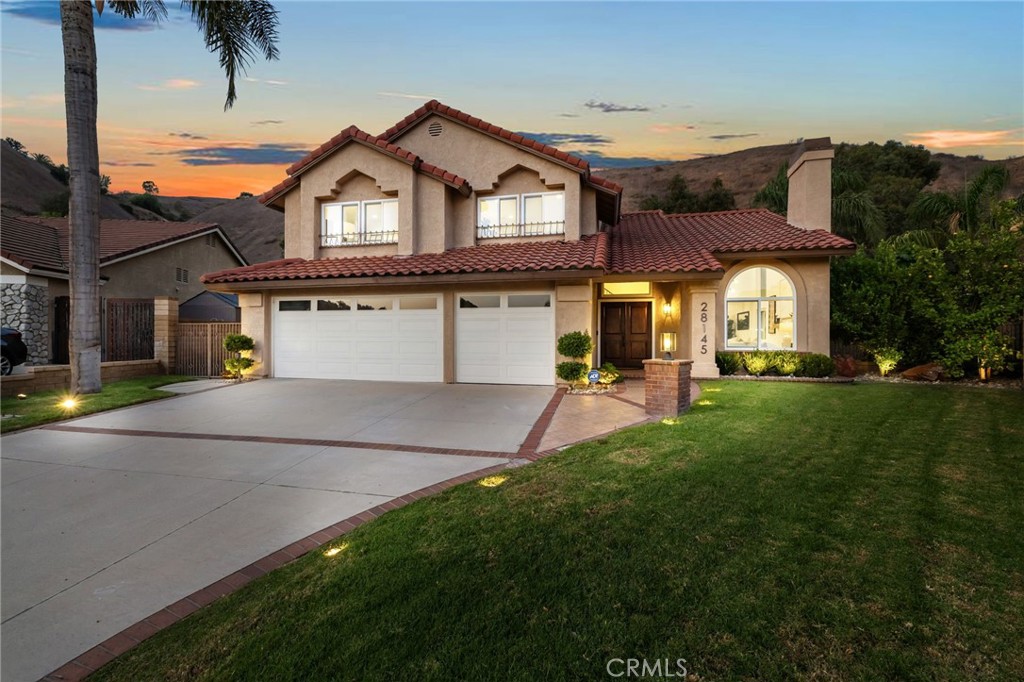 Tucked at the end of a quiet cul-de-sac in the hills of Yorba Linda, 28145 Shady Meadow Lane is the kind of home that just feels like home the second you step inside. Thoughtfully redesigned from top to bottom, this 5-bedroom, 3-bathroom home blends modern upgrades with classic comfort. The kitchen is all new and ready for action, with solid wood shaker cabinets, quartz countertops, subway tile backsplash, and quality appliances. Premium white oak hardwood floors, new double-pane windows with premium blinds, smooth coat walls, upgraded lighting, custom built-ins, and solid-core doors throughout give the whole space a polished feel. Upstairs, the primary suite is a total retreat with dual walk-in closets, a spa-style bath, and a private balcony with mountain views.
With four bedrooms up and one downstairs, it’s the perfect layout for guests or multigenerational living. Brand-new Trane AC systems with zoned control, a new Rinnai tankless water heater, and all-new ductwork keep things comfortable and efficient year-round. The three-car garage with epoxy floors is as functional as it is sharp, and solar panels help keep energy costs in check. Out back, mature fruit trees and a deck offer a quiet place to unwind.
Parks, shopping, and convenient access to major roads round out the package. This is Yorba Linda living, dialed in.