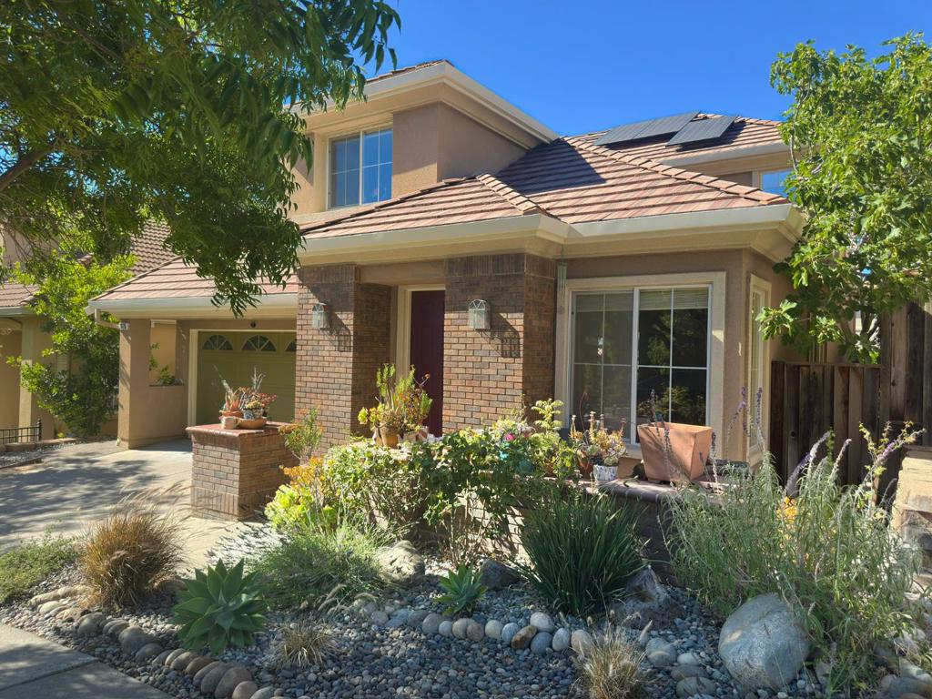 LOS GATOS SCHOOLS! Welcome to the best value in the neighborhood! This beautifully updated contemporary home offers a spacious, light-filled floor plan with soaring vaulted ceilings, custom built-ins, and plenty of room to entertain. The open-concept kitchen flows seamlessly into the living room and out to the private backyard perfect for indoor-outdoor living. Upstairs, you'll find four generously sized bedrooms, including a luxurious primary suite with a spa-like bathroom retreat. This eco-friendly home offers a low-maintenance yard with drip system, owned solar and 220v EV Charger. Located within the highly sought-after Los Gatos School District with Blossom Hill Elementary, RJ Fisher Middle, and Los Gatos High School. This home also enjoys easy access to nearby trails and top commuter routes. Don't miss this rare opportunity to own a stunning home in an unbeatable location. This is the best home on the market in its price range!