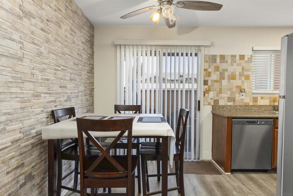 REDUCED! This home in the Lakeshore Villas offers a rare combination of ground-floor convenience, end-unit privacy, tasteful upgrades including: bleached wood laminate flooring throughout, granite counters in kitchen and bathroom, stainless appliances, beautiful tile wall in dining room; a private outdoor patio, all within a community that includes a pool and easy access to local amenities. If that isn't enough, it is right next to Libby Lake Park where you can walk, picnic and BBQ, enjoy the playground and the beautiful lake with fountains. This home in the Lakeshore Villas offers a rare combination of ground-floor convenience, end-unit privacy, tasteful upgrades including: bleached wood laminate flooring throughout, granite counters in kitchen and bathroom, stainless appliances, beautiful tile wall in dining room; a private outdoor patio, all within a community that includes a pool and easy access to local amenities. It is well-positioned for both homeowners and investors seeking a low-maintenance, comfortable living space in Oceanside. If that isn't enough, it is right next to Libby Lake Park where you can walk, picnic and BBQ, enjoy the playground and the beautiful lake with fountains. The HOA covers access to the pool and spa, exterior building maintenance, exterior landscaping, common area maintenance, and...sewer, trash pickup and water are all covered and wrapped up in one payment each month! No separate expense for those items. Come see your new home--just 7 miles to the beach!