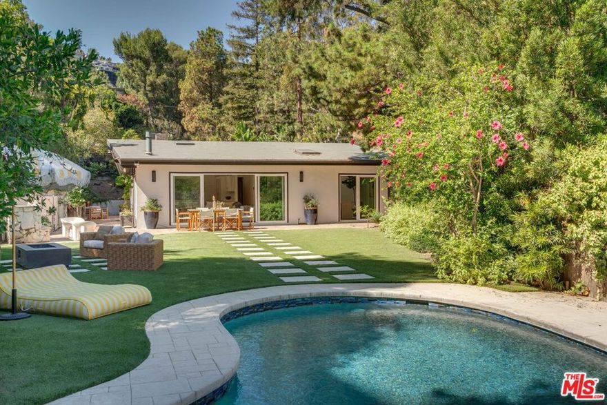 Single-story mid-century in Lower BHPO! Features soaring vaulted ceilings, French oak floors, and an open floor plan filled with natural light. The updated kitchen opens to the living spaces, and sliding doors create seamless indoor/outdoor living leading to a lush lawn and sunny pool area. The primary suite offers a large closet and spa-like bath. Located in the Warner School District. Property is compliant with emergency order guidelines.