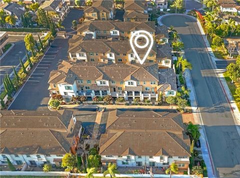 Photo of 16901 Airport Circle Cir #107, Huntington Beach, CA 92649 (MLS # OC26067728)