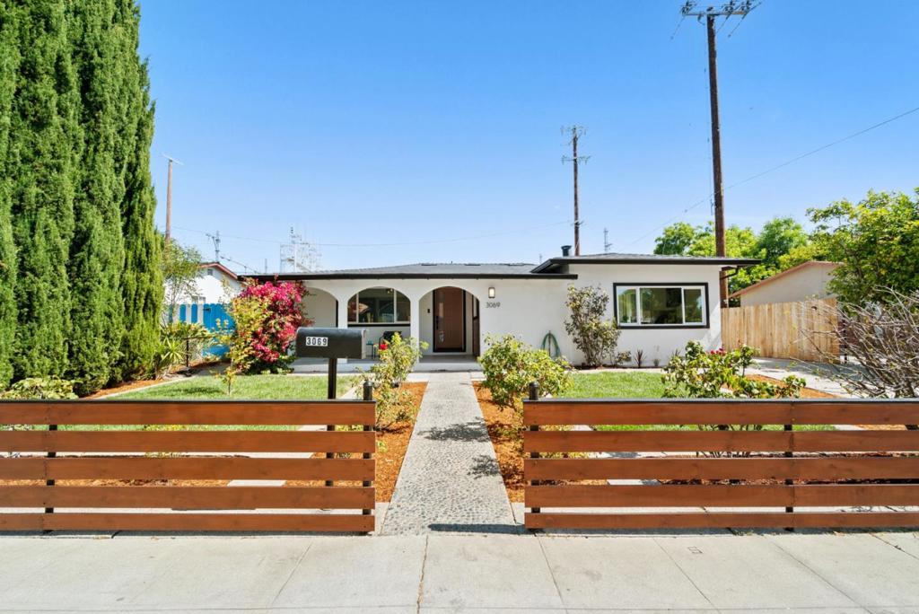 Welcome to this beautifully renovated 4-bedroom, 2.5-bath home offering 1,537 sq ft of modern elegance & comfort in one of Santa Claras most desirable neighborhoods. Thoughtfully updated throughout, this move-in-ready residence features a brand-new roof, new dual-pane windows, & new wide-plank engineered wood flooring for a seamless, upscale look. The stunning kitchen is a true showpiece; all-new cabinetry, quartz countertops, premium Forno gas range, & Frigidaire Energy-Star appliances. Skylights in the kitchen & bathroom bring in natural light. Bathrooms feature modern tile flooring & updated finishes that blend style with function. Enjoy year-round comfort w/ central AC, gas heating, & energy-efficient upgrades. The indoor laundry offers gas/electric hookups & there's a detached storage shed that adds convenience. Outside, the freshly landscaped front yard features new sod & automatic sprinklers. The backyard offers abundant space, w/ a BBQ area, conversation space & a fire pit; perfect for enjoying California living. The new rolling driveway gate, allows for RV or boat storage. Located on a calm street near top-rated schools (walking distance to Wilcox High), tech employers (NVIDIA, Apple, etc), restaurants, & shopping, this home truly offers the best of Silicon Valley!
