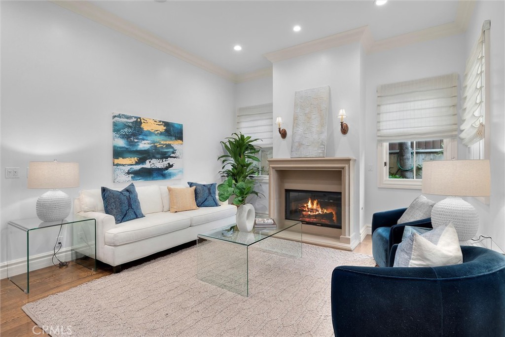 Located in the prestigious Manhattan Beach Hill section and completed in 2007 by JRO Development and Mark Trotter, this Mediterranean masterpiece features a timeless layout, an entertainer's dream backyard, and all on an oversized 8,020 square foot lot. The home features 5 bedrooms, 5 bathrooms, 4,765 of living area, high ceilings, 3 car garage, and extensive driveway with extra parking. The downstairs level features 1 bedroom with ensuite bathroom, ample living room space, indoor/outdoor living with sliding doors leading to the backyard, chef's kitchen with Viking appliances, butler's pantry, formal dining room, and wine refrigerator. The second level features 4 bedrooms including the generously sized primary suite & primary bathroom with jacuzzi tub, and large walk-in closet; as well as laundry room and open sitting area for a den/office/playroom. The backyard underwent an extensive renovation when the owners added a pool and cabana complete with wet bar, tv. Inches to the greenbelt, blocks to the beach, and less than 1 mile to Downtown MB and the best that Manhattan Beach has to offer.