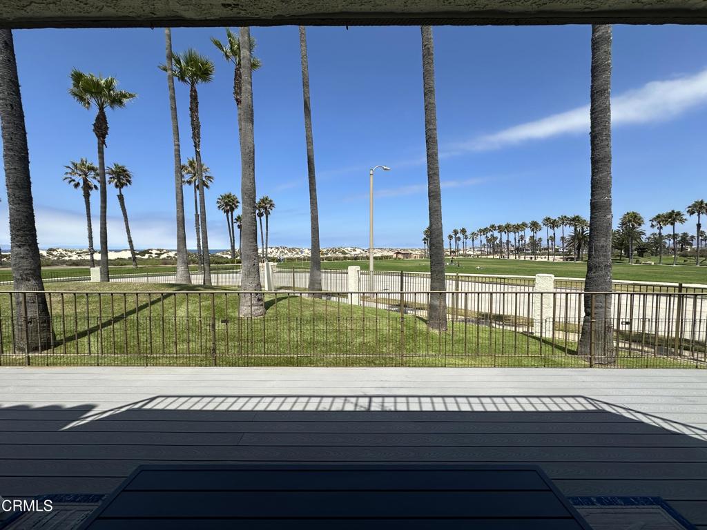 Welcome to The Colony at Mandalay Beach a premier coastal community located halfway between Malibu & Santa Barbara. Introducing a captivating residence offering an array of features in a most desirable location! The heart of the villa lies in the expansive trex deck with ocean, island & sunset views! From morning coffee to evening gatherings, this outdoor oasis is sure to delight! Remodeled kitchen, laminate flooring throughout for easy care as well as recessed lighting. A two car attached garage with direct access & extra storage. Residents of The Colony enjoy resort-style amenities: two sparkling pools, six soothing spas, tennis, pickleball, racquetball, ping-pong, a fully equipped fitness center, clubhouse & 24 hr. security. All just moments from the beach, vibrant harbor life, Farmer's Market, shopping, dining & endless opportunities for kayaking, paddle boarding & boating. Don't miss your chance to enjoy the ultimate coastal lifestyle!
