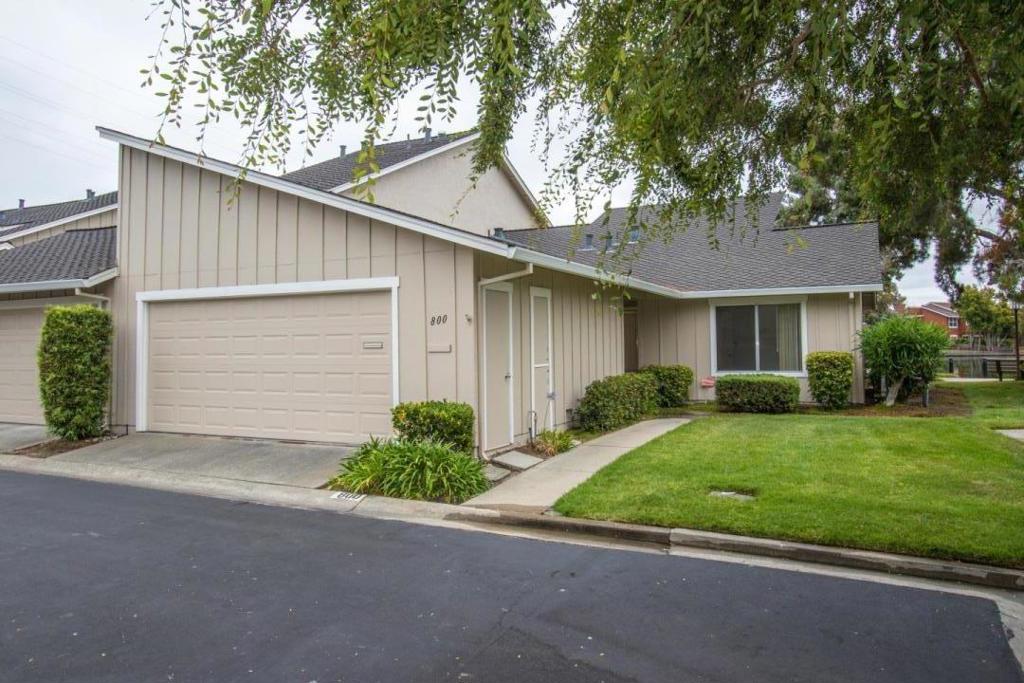 Lovely remodeled end unit on the water! Three spacious bedrooms, two baths, two-car garage. Fresh and light interior paint, new kitchen cabinets, quartz countertops, and hardwood floors. Brand new carpeting in all bedrooms. This waterfront home is for rent in the quiet, scenic Harborside community. Close to pool, tennis courts and a beautiful clubhouse.