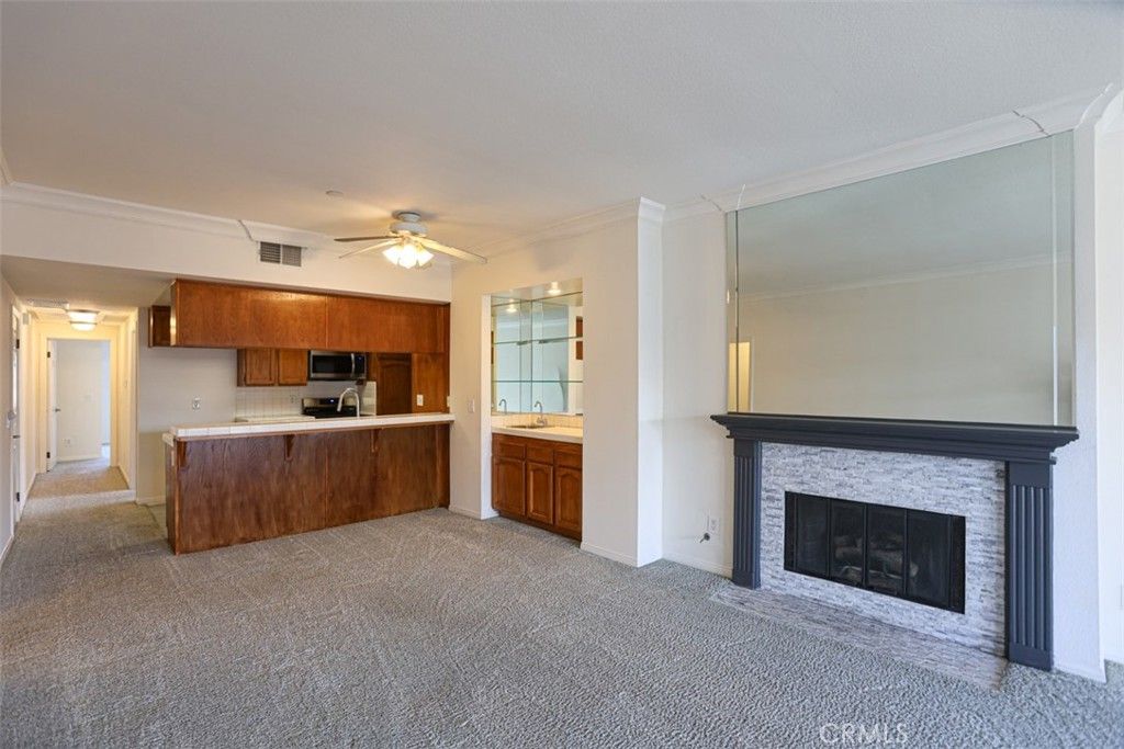 Photo of 11630 Warner Avenue #614, Fountain Valley, CA 92708 (MLS # OC26071396)