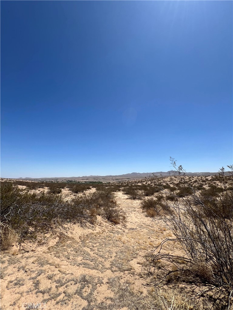 Incredible opportunity to own 40 acres of flat, usable land in the High Desert region of Victorville — just south of Desert Flower Road and near the Mojave River. Zoned A-E (Agricultural Exclusive), this expansive parcel is ideal for a variety of uses including farming, ranching, livestock, or building a custom rural retreat.
The property is located minutes from major transportation corridors including I-15, Highway 395, and the Southern California Logistics Airport (SCLA) — offering convenience, future growth potential, and strong investment value.
-40 Acres
-Zoning: A-E – allows agriculture, animals, and one residential dwelling
-Near the Mojave River – serene natural surroundings
-Approximately 2 miles off Desert Flower Rd via unpaved sandy road (high-clearance vehicle recommended)
-Strategic location near I-15, Highway 395, and SCLA
-Perfect for investors, homesteaders, farmers, or land banking.
Buyer to verify all zoning, land use, utility access, and development requirements with the City of Victorville and San Bernardino County.