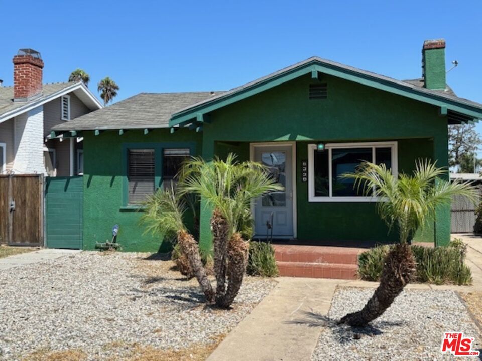 This 1920's Bungalow style home has been owned by the previous family for more than 20 years. With its bold color and drought tolerant front landscaping, is ready for a new life. The property will need some TLC and offers incredible potential. Located in the Park Mesa Heights neighborhood of Los Angeles, this home is perfect for first time buyers with vision or seasoned investors. The possibilities are endless, with a 2 car detached garage (think ADU, Buyers Due Diligence) and a large 5,440 sqft lot there is room to expand or rebuild. ** The property is being sold AS IS and it's 82 yo owner passed away peacefully surrounded by loved ones 2/2025. Don t miss this chance to own and create something special in a great location! - More photos coming.