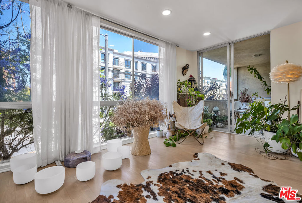 Exceptional Brentwood Gem. Bright, Charming, and Unique. Located in the heart of vibrant Brentwood, this 2-bedroom, 2-bathroom home offers charm, style, and comfort in one of the Westside's most desirable neighborhoods. The open-concept layout features beautiful hardwood floors, abundant natural light, and an updated kitchen and bathrooms. Enjoy your own private patio with serene tree-lined views and a peaceful outlook toward Montana Avenue perfect for relaxing or entertaining. Both bedrooms are spacious, with ample storage and modern finishes throughout. Just steps from the beloved Sunday Farmer's Market and surrounded by Brentwood's best restaurants, cafes, and boutiques. The building offers resort-style amenities including a pool, sauna, gym, and two dedicated parking spaces. A truly rare find blending location, lifestyle, and livability.