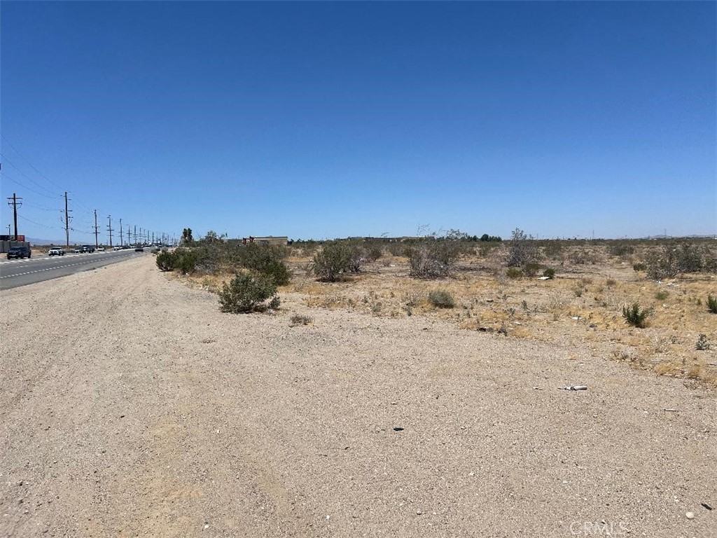 Palmdale Rd. Great Parcel On a very busy Main Road in town, 3103-601-22, 5.07 acres, zoned commercial that allows for all permitted Neighborhood Retail activities. Utilities are in the street. Property is on the corner of Palmdale Rd/ Hwy 18 and Mesa Linda Ave. Land is walking distance from Starbucks, Rite Aid, banks, restaurants, and other major shopping centers. Buyer and buyer's agent to verify utility and zoning information with the proper agencies. The Next Door Lot available as well. Excellent Place for Commercial Business