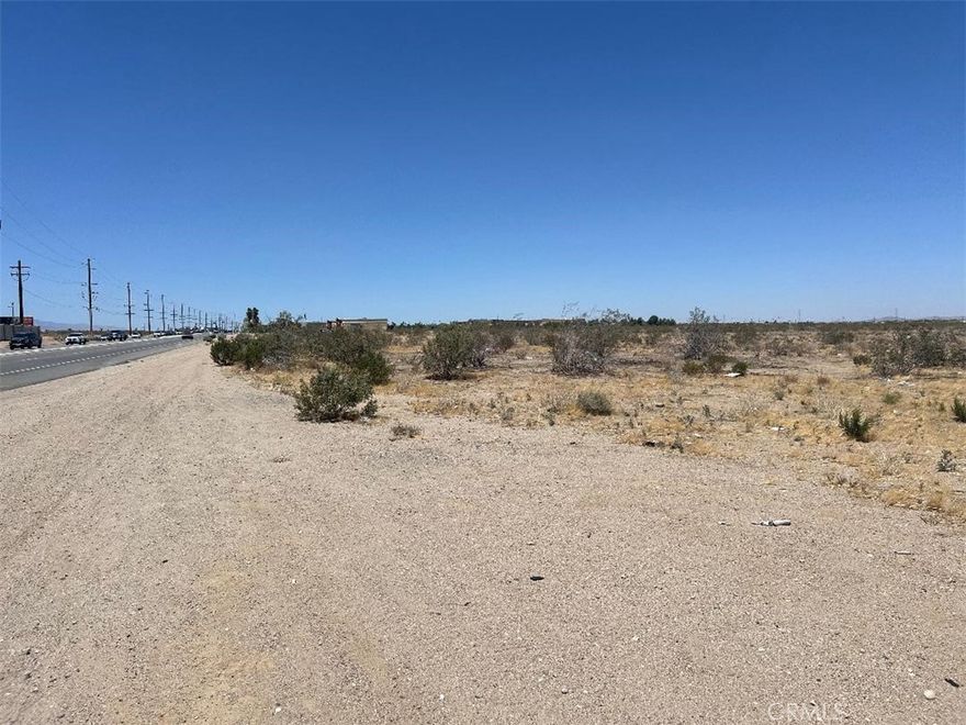Palmdale Rd. Great Parcel On a very busy Main Road in town, 3103-601-22, 5.07 acres, zoned commercial that allows for all permitted Neighborhood Retail activities. Utilities are in the street. Property is on the corner of Palmdale Rd/ Hwy 18 and Mesa Linda Ave. Land is walking distance from Starbucks, Rite Aid, banks, restaurants, and other major shopping centers. Buyer and buyer's agent to verify utility and zoning information with the proper agencies. The Next Door Lot available as well. Excellent Place for Commercial  Business, Next to power lines for good business and solar panels