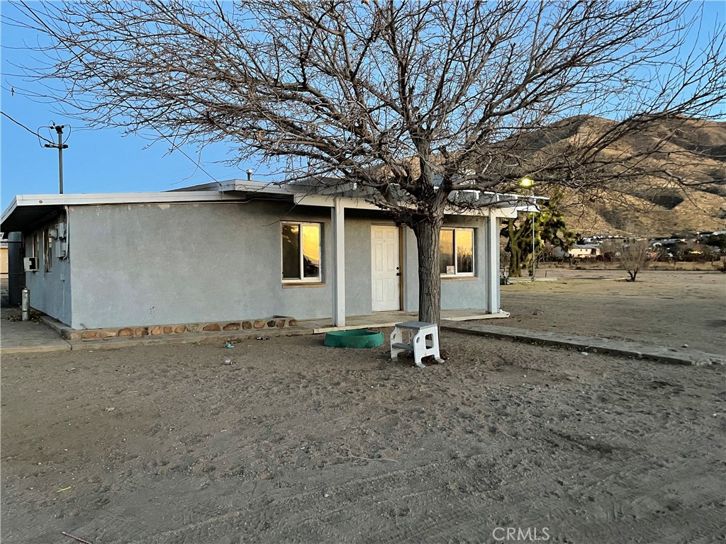 Don't miss your opportunity to purchase this spacious ranch property. Situate on a lot over 2 acres with beautiful views, this two bedroom, two bath home comes with a detached garage, and RV hookups with plenty of room for horses or expansion. Great for first time buyers or as an investment opportunity, this one is a must see!
