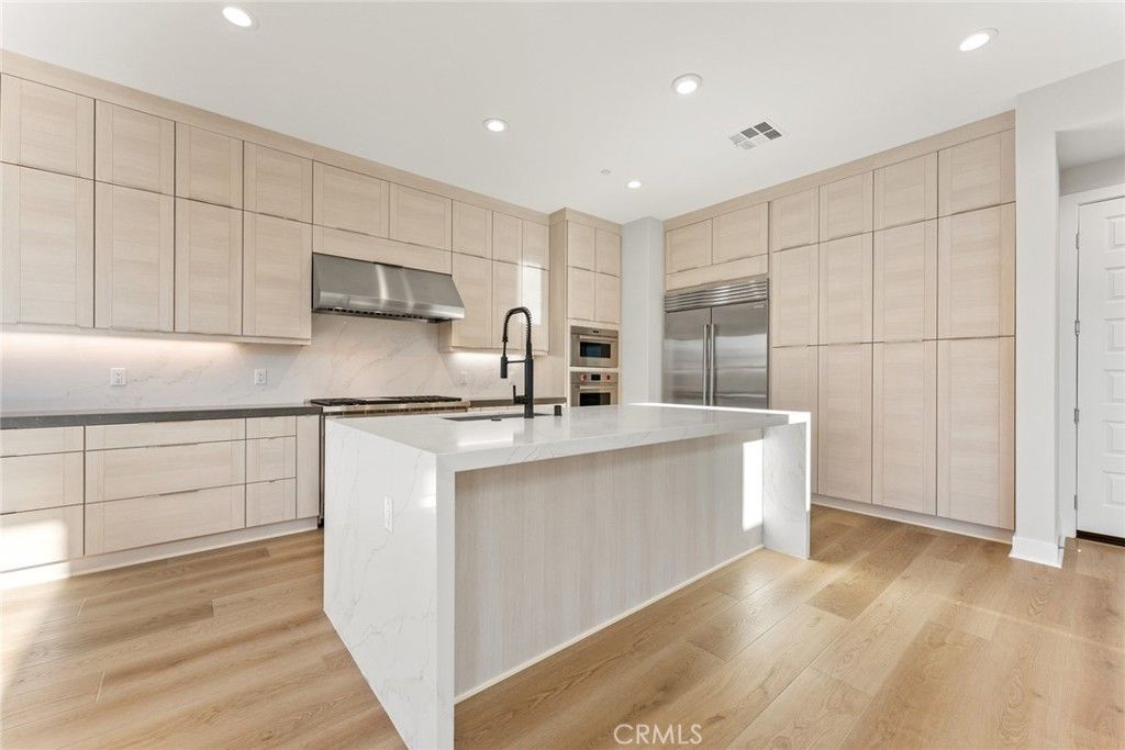 Photo of 209 Stage, Irvine, CA 92618 (MLS # OC26110086)
