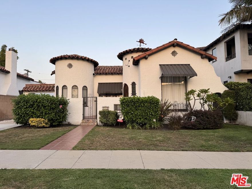 Classic Courtyard Spanish-style home in the accessibly hip Mid-Wilshire/Beverly Center neighborhood. This mint-condition residence beautifully blends original charm with thoughtful modern updates. Methodically restored and maintained, it features newer systems, three large bedrooms and two full bathrooms, cedar-lined closets, and magnificent vintage-tiled baths. The center-hall floorplan offers generous living spaces, rich wood floors, and graceful wrought-iron detailsincluding a whimsical clipper ship weathervane. A large private yard provides an ideal outdoor retreat, complemented by a substantial garage perfect for storage or parking. Located moments from Cedars-Sinai Hospital, world-class shopping, museums, and dining, as well as Beverly Hills and West Hollywood, this is a truly exceptional lease opportunity in one of L.A.'s most desirable and convenient neighborhoods.