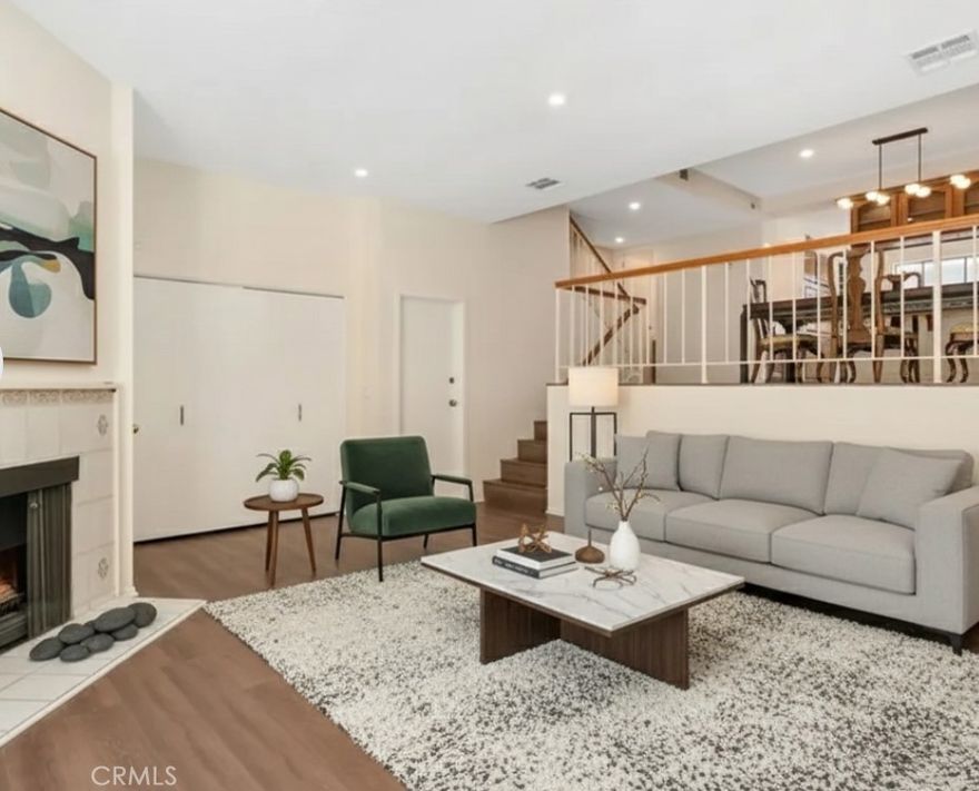Discover comfort and style in this beautifully updated 2-bedroom, 2.5-bath townhome, nestled in the gated Tarzana Villa South community. Step inside to a bright and open living space featuring brand-new flooring, recessed lighting, and a cozy fireplace that sets the tone for relaxing evenings at home. The kitchen includes a breakfast bar, ideal for casual dining, morning coffee, or gathering with loved ones. Upstairs, you’ll find two spacious bedrooms, each offering ample closet space and plenty of natural light. The convenience of in-unit laundry and central HVAC ensures comfort all year long. Enjoy your own private patio, perfect for quiet mornings or weekend entertaining. As part of the Tarzana Villa South community, you’ll have access to wonderful amenities including a sparkling pool, tennis court, and clubhouse, all set within a peaceful and well-maintained neighborhood. Located just minutes from Ventura Blvd, top-rated schools, shopping, dining, and the 101 freeway, this home offers easy access to everything Tarzana has to offer.