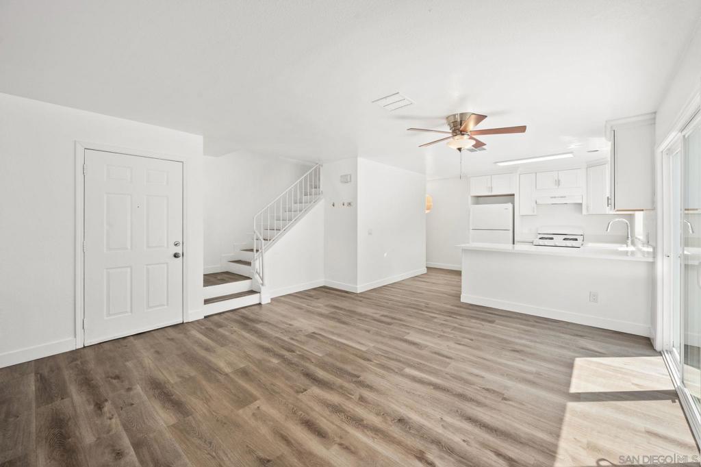 Newly Remodeled Townhome in the Heart of Chula Vista. Best Location! Quiet, private, small 3 Townhome gated community. This large 1500 sqft home features: 3 bedrooms 2.5 baths, Lots of natural light, new laminate flooring throughout, freshly painted, Newer Designer Kitchen with quartz counter tops and newer appliances, Cozy Fireplace in Living room, guest half bathroom located on the first floor, Primary bedroom with walk in closet and en-suite bathroom, All Bedrooms located upstairs, Extra Large attached two car garage with plenty of storage space, and washer and dryer hookups, also has a very nice private sunny backyard with grass and a patio for BBQ. MOVE IN READY NOW! Walk to Shops Restaurants and Farmers Market!