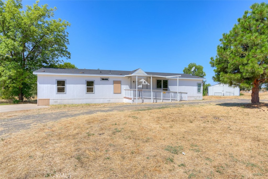 THIS IS A CASH SALE. Bring your tool belt and creativity—this property offers endless possibilities! Nestled on a private and expansive 5-acre lot, this spacious 3-bedroom, 2-bath home includes two bonus rooms and over 2,000 square feet of living space just waiting to be revitalized. Whether you're looking to build your dream retreat or start your own homestead, this property has the potential to make it happen. With multiple horse stalls and a large shop, there's ample room for livestock, hobbies, and more. The home sits on a permanent foundation; however, due to its current condition, a cash sale will be required.