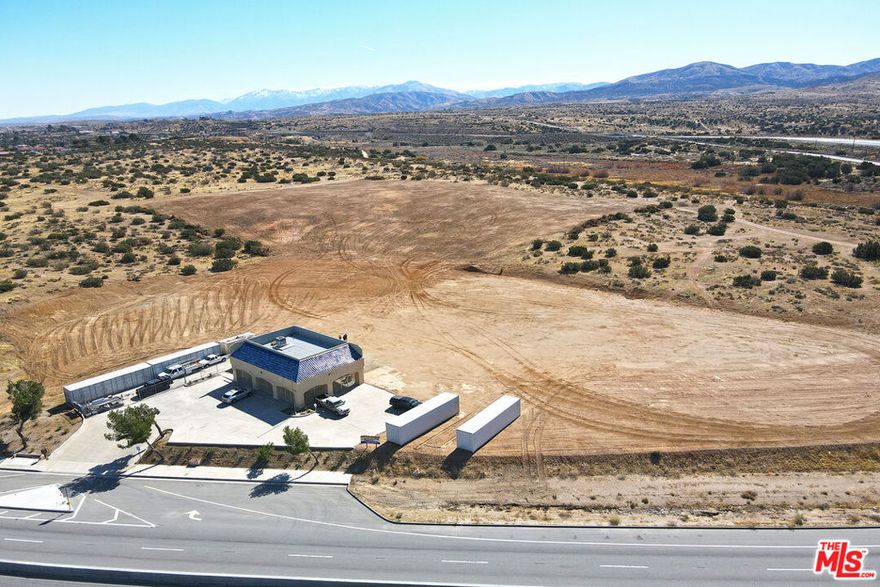 Looking for an exceptional property with new development in Progress in Palmdale, CA? Look no further than this 1,200 SF recently rennovated office building and 9.34 acre parcel of flat land! with over 800 of Pearblossom Highway frontage. This property offers excellent exposure for your business or future development project. Located at 2660 Pearblossom Highway, just east of 25th Street East in Palmdale, this property offers quick and easy access to downtown Palmdale, the airport, Highway 14 and Highway 138. The office building has direct access from the newly reconstructed Pearblossom Highway. The property consists of three separate parcels of land. The office building is located on APN 3053-009-017, which is approximately 2.43 acres in size and has recently been graded for development. The adjacent parcel, APN 3052-015-055, is approximately 1.76 acres and has high daily traffic volumes for excellent marketing exposure. To the south is APN 3052-015-058, a 5.15-acre residential parcel. Parcels 017 and 055 are zoned C1 (Light Commercial), which allows for a wide range of non-residential uses, including office, retail. Parcel 058 is zoned R-1-1. Buyers should verify zoning and that it will allow their intended use. The office building has water (including fire hydrant). Current owners have plans underway to develop a boat & RV storage and a self-storage facility.
