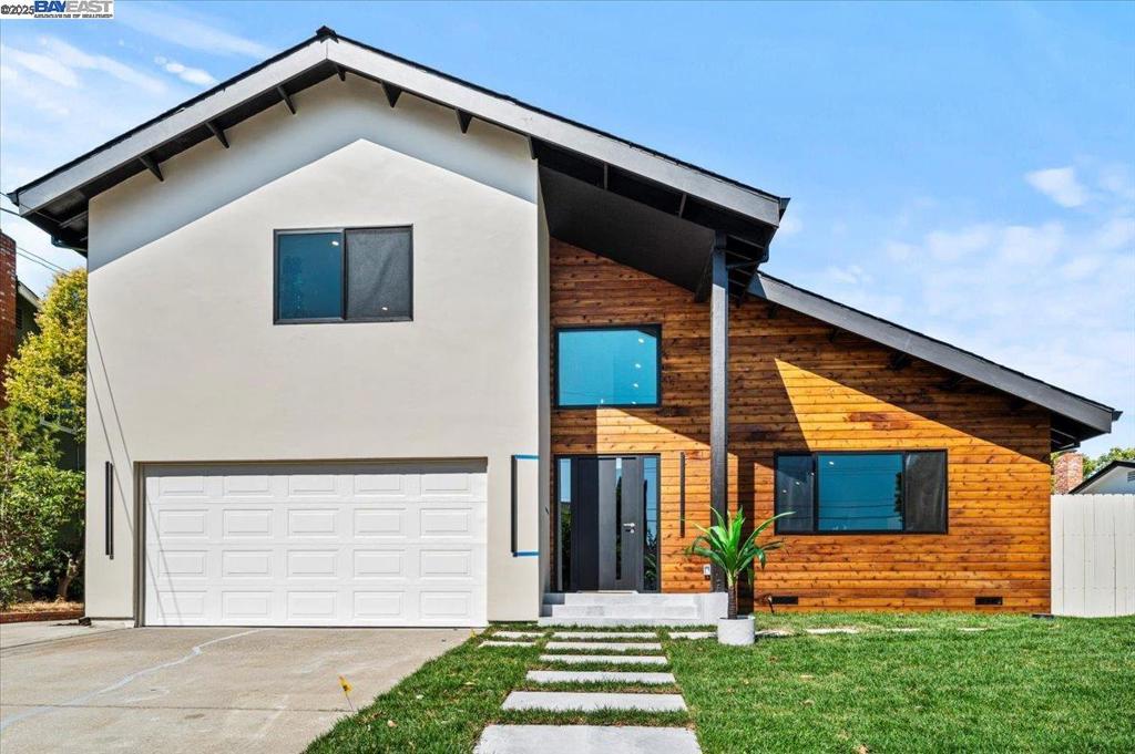 Come discover this stunning remodel in the heart of Pleasant Hill. 2162 Orin Ln is a beautifully reimagined home that blends contemporary design with thoughtful functionality. This extensively renovated property boasts a permitted 498 sq. ft. addition, including an expanded front living area and a brand-new second-story primary suite. Inside, enjoy all-new insulation, drywall, and a complete electrical rewire with a 200-amp panel, paired with recessed LED lighting and a stylish custom lighting package. Nine new skylights, smooth Level 4 wall finishes, engineered hardwood flooring, fully remodeled bathrooms, and custom staircase with modern railing elevate the home's aesthetic appeal. The gourmet kitchen is a chef’s dream, featuring custom cabinetry, quartz countertops, a full backsplash, built-in appliances, and a large island with pendant lighting. A walk-in pantry with custom shelving and a built-in wine cabinet provide elegant storage solutions. Outside, enjoy peace of mind with a new roof, modern gutter system, and energy-efficient dual-pane windows. The front and backyards have been fully landscaped, complete with tile hardscape, lush sod, colorful plantings, and an automatic sprinkler system. Two new fences with side gates ensure privacy and security.