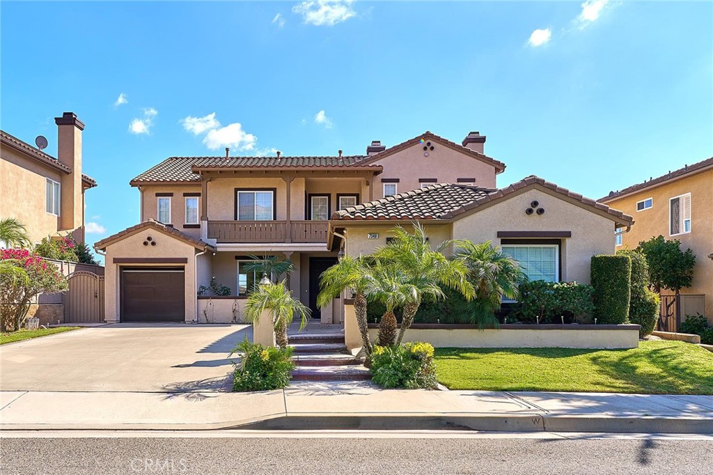 Wow! This gorgeous Serrano Heights Home has been completely remodeled inside & features unobstructed breath-taking panoramic views of city lights, mountains, the ocean & Catalina. Almost too many upgrades to list, which include travertine floors, granite counter tops and backsplash, gourmet kitchen complete with stainless steel appliances including double door built-in stainless refrigerator, and a custom built extra large center island. Crown and base molding, top quality painting, recess lighting throughout and built-in speaker. With majestic vaulted ceiling, a luxurious spiral staircase. One room downstairs with full bath, great room with fireplace, living room with fireplace, and formal dining room. Second level floors are all Brazilian cherry wood. Second floor includes a master suite and three additional bedrooms. Master suite includes master bathroom with tub and separate shower, double sink vanity, and two separate walk-in closets. This fine estate is located on a single loaded street with no rooftops to spoil the views. The night time views are especially spectacular. This is quiet, private location on a single-loaded street where you can enjoy a cool breeze and access to miles of trails. It's no wonder that these are the most popular in Serrano Heights. Come and check out your dream home in Orange hills.