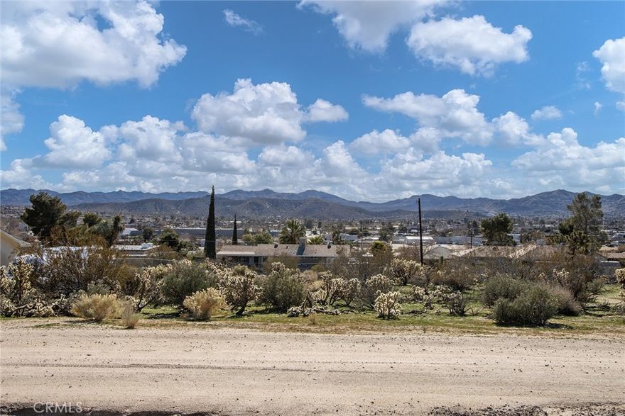 SEE THE VIDEO ABOVE!! Best-priced lot in town! Wonderful hillside lot in Yucca Valley with viewsThis property is near Joshua Tree National Park and other popular tourist destinations!! Great neighborhood close to all amenities, groceries, and stores. Skyline and city lights views. Utilities are available in the street. Plenty of natural desert fauna. Yucca Valley is a growing city. 30 miles from Palm Springs. 122 miles to downtown Los Angeles. Buyers must verify all utilities, zoning, and usage with all appropriate agencies.SEE THE VIDEO ABOVE!! Best-priced lot in town! Wonderful hillside lot in Yucca Valley with viewsThis property is near Joshua Tree National Park and other popular tourist destinations!! Great neighborhood close to all amenities, groceries, and stores. Skyline and city lights views. Utilities are available in the street. Plenty of natural desert fauna. Yucca Valley is a growing city. 30 miles from Palm Springs. 122 miles to downtown Los Angeles. Buyers must verify all utilities, zoning, and usage with all appropriate agencies.