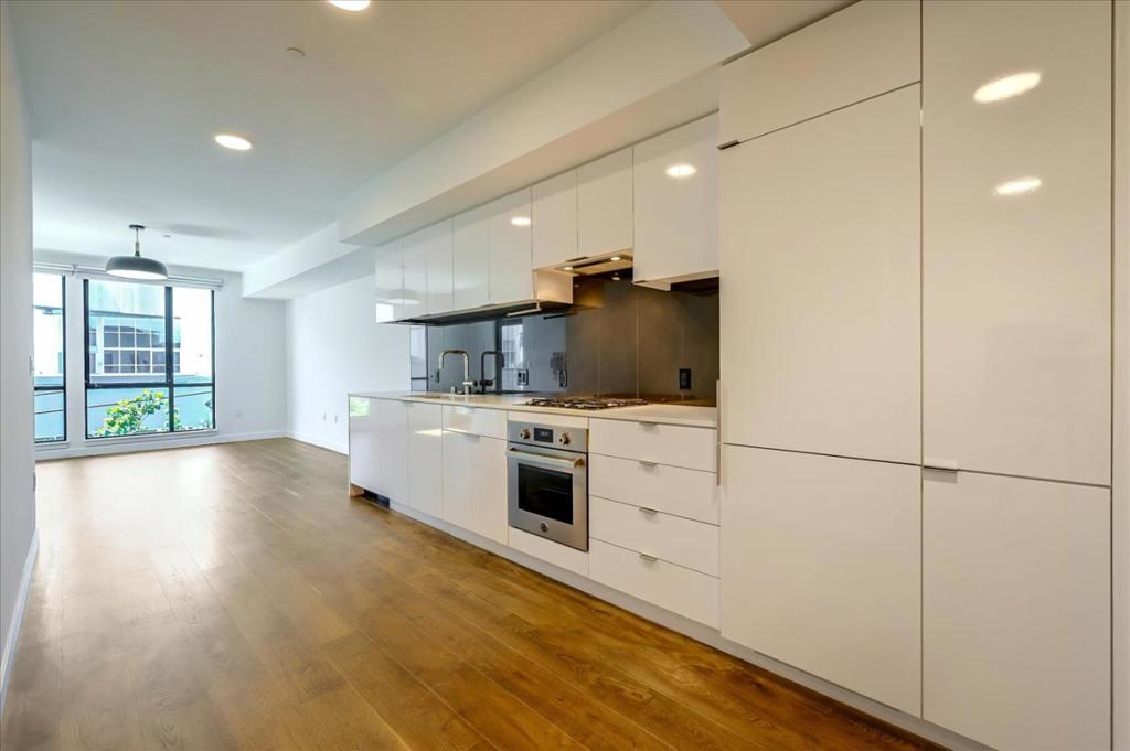 This charming one-bedroom, one-bathroom condo home welcomes you with warmth and simplicity! Feel immediately at ease with the single-wall kitchen with built-in cabinets and high-end appliances to optimize space while keeping it streamlined and functional! A laundry closet equipped with a washer and dryer is also cleverly hidden in a hallway closet. The bedroom features plush carpeting and a walk-in wardrobe with built-in drawers for personal storage. A translucent glass window dramatically lets soft natural light in throughout the day. Floor-to-ceiling glass windows in the cozy living room give you views of the neighborhood while a glass door leads to a private balcony. An A/C and a heater are both available to keep your home temperature agreeable all year round. Rent includes a storage unit. This home is situated in an apartment complex with a fully equipped gym, a rooftop with a fireplace and gorgeous views, multiple grills to host events, and a shared beautiful lounge area! This home is a block away from the supermarket and has very convenient access to the Financial District, and for those who need to move around the Bay Area - the highways! *Parking spot available for an additional $300/month. Pet Friendly Pet Deposit - $500