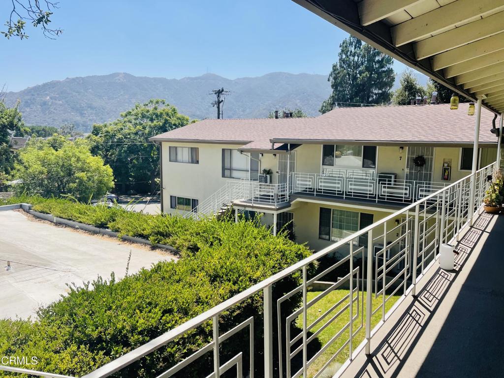 Light and bright upstairs END unit featuring 3 bedrooms and 1 bath, with mountain views and fresh updates throughout. Enjoy a newly remodeled kitchen, brand new flooring, ceiling fans, and a powerful new AC wall unit. Beautiful outdoor space, including a swimming pool. Onsite laundry and plenty of parking available, including one covered spot. Located in charming Montrose--known for its top-rated schools, walkable shops and dining, and excellent city services. A rare find in a sought-after neighborhood!