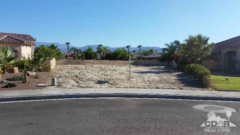 Incredible opportunity to build your dream home on one of the best buildable lots in Palm Desert . Lot is located on a fantastic, quiet, large southwest corner lot on the interior perimeter of the prestigious ungated community of Desert Mirage! Take advantage of the wonderful views of the Santa Rosa and San Jacinto mountains. Utilities right up to site on paved ,curbed side walked street. Completed plans included in purchase price for gorgeous 3 bedroom 3.5 bath home close to 3000 sq. ft., with open floor plan , pool/spa and two car plus golf cart garage. Call agent for more details or copy of plans for review.