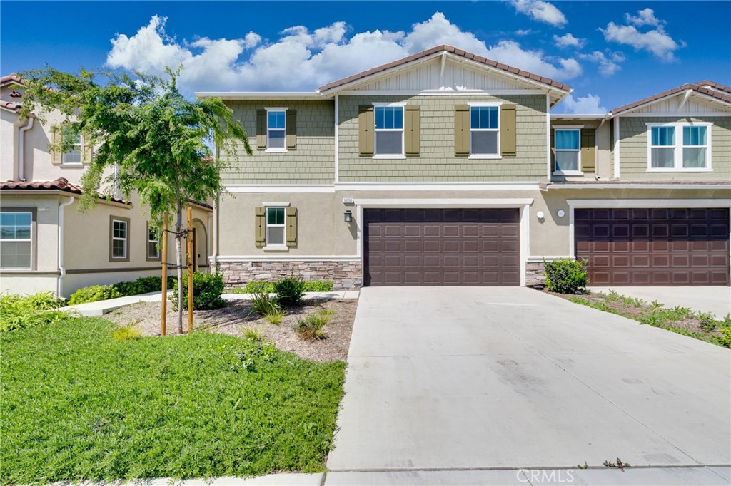 Back on market!! Magnificent Duplex-Style Townhome in Prestigious Chino. This elegant duplex-style townhome offers an unparalleled blend of sophistication and comfort and isnestled in the highly sought Chino Preserve. Boasting four spacious bedrooms plus a grand upstairs bonus room, this meticulously designed residence offers the downstairs bedroom with its own full bath, perfect for guests or multi-generational living. Step inside to discover a light-filled sanctuary, where expansive living spaces are adorned with high-end upgrades, including custom plank flooring, modern window treatments, plush carpeting, and sleek tile finishes.The kitchen is a chef’s delight, featuring white cabinetry, premium stainless steel appliances, and a seamless flow into the open-concept living and dining areas. The elegant living room extends effortlessly to a private, spacious backyard through the French doors, offering a serene retreat with newly installed concrete and a charming garden space. Upstairs, the luxurious primary suite boasts an expansive walk-in closetand a spa-inspired ensuite bath. A dedicated laundry room adds convenience, while the attached two-car garage with anextended driveway—large enough for an RV—ensures ample parking. Additionally, an integrated solar system enhances energy efficiency. Additionally, this homeprovides access to top-rated schools including Cal Aero Academy (K-8) and Chino Hills High School. This stunning property is ideal for families, professionals, or investors a refined experience.