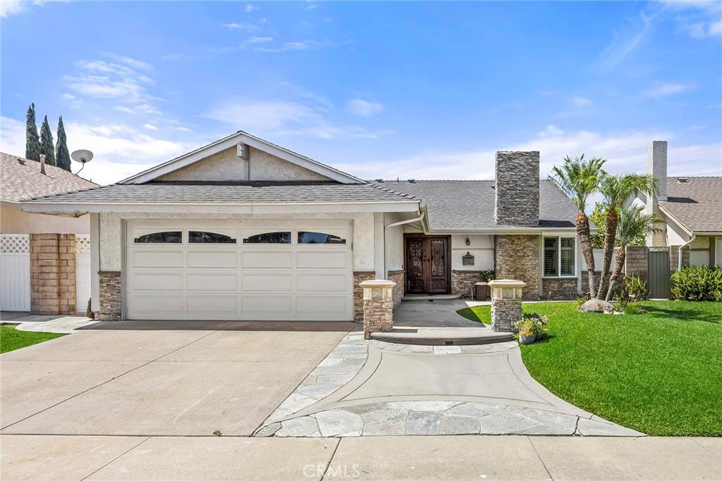 Photo of 5034 E Woodwind LN, Anaheim, CA 92807 (MLS # PW26080495)