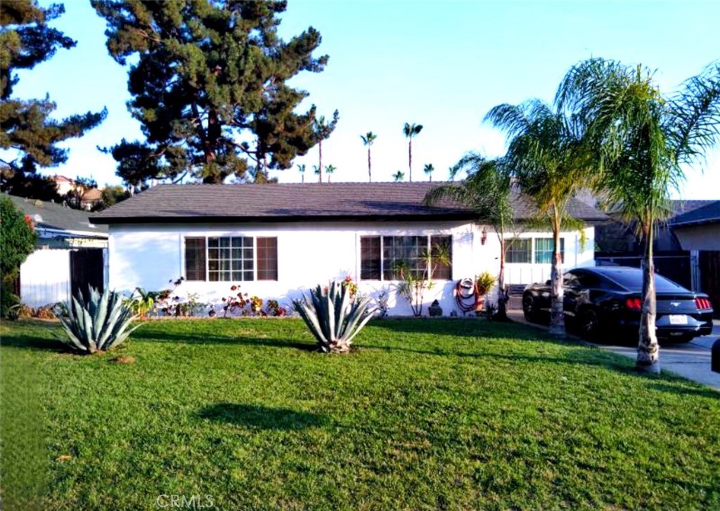 Welcome to this charming Riverside home, ideally located near Magnolia and Van Buren Blvd with convenient access to shopping centers, grocery stores, restaurants, and major freeways. This well-maintained property offers 3 bedrooms, 2 bathrooms, and a versatile office space—perfect for remote work or study. Enjoy outdoor living with two covered patios that provide generous shade on both sides of the home, ideal for relaxing or entertaining. The backyard features lush green landscaping, two built-in storage sheds, and ample space for gatherings. A long driveway allows for plenty of off-street parking. Nestled on a quiet street, the home has been freshly painted inside and out. Buyers and agents to verify all information, including square footage, lot size, and bedroom count. Don’t miss this centrally located gem in the heart of Riverside!