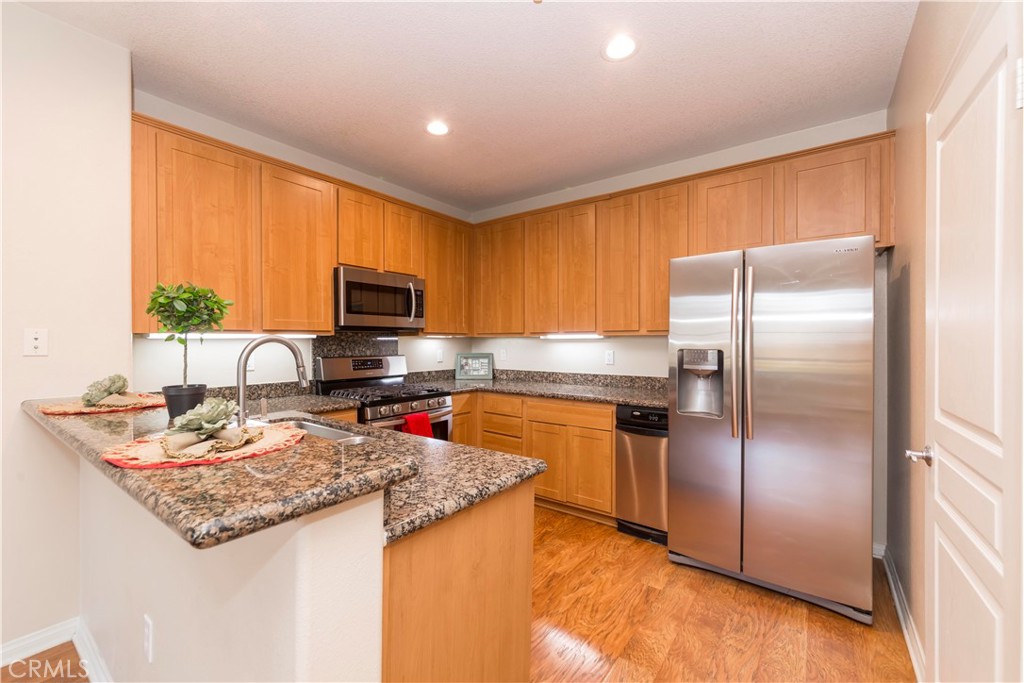 Gorgeous and well maintained resort style living in heart of OC. A great gated community, Chapman Commons, was built in 2007 and offers many amenities to for you to relax, recreate, and fully enjoy Southern California weather. Come and see why this is more like living in resort; huge swimming pool with a spa that is perfect for the hot summer days, BBQ grills by the pool for you to enjoy a relaxing Sunday afternoon, or if you prefer working out, a fully equipped gym is ready for you in the community. A large club house can be reserved if you have any special events that you need to host! This spacious home boast 3 bedrooms and 2 bathrooms, with open living space. Enjoy your morning and evening relaxing on your balcony enjoying the views. Minutes away from UCI Medical Center, Christ Cathedral, DISNEYLAND, CALIFORNIA ADVENTURE, HONDA CENTER , ANGEL'S STADIUM, you are in the center of entertainment distric of OC. Landlord pays for HOA fees which include TRASH, WATER and GAS. Tenants pay for electricity, cable and internet. 3 assigned parking spaces are included in the subterranean parking structure. MAKE IT A POINT TO SEE THIS BEAUTIFUL HOME IT'S GONE !!!