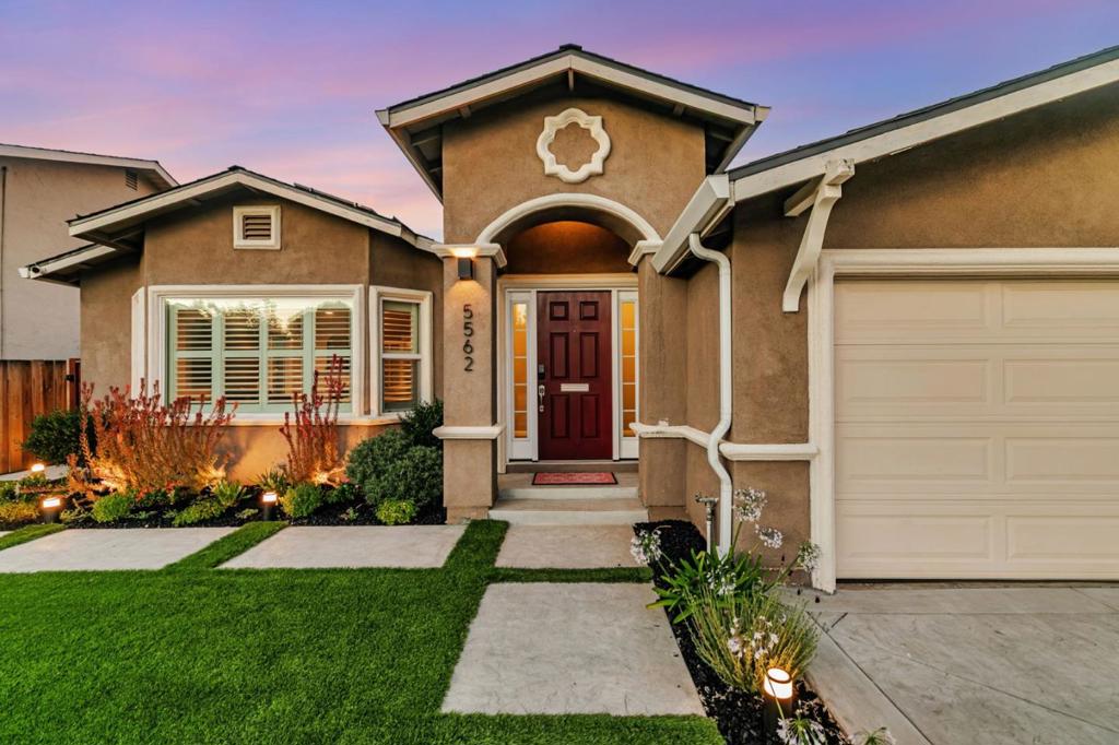 Welcome to this beautifully remodeled Blossom Valley gem, where thoughtful design meets modern comfort. From the stunning front and back landscaping to nearly 2,000 square feet of stylish interior living space, this home truly shines. Once inside, you'll find two primary suites, one set apart from the other bedrooms, providing ideal flexibility for guests, multi-generational living, or a private retreat. The backyard feels like your own personal resort, complete with an in-ground hot tub, elegant fire pits, and lush, high-end turf. A detached studio adds even more versatility, perfect for a home office, gym, playroom, or creative space. Other highlights of this property include: owned solar, new A/C and furnace, added water softener, indoor/outdoor carpet in garage and a gorgeous kitchen. This is one not to be missed! Welcome Home!