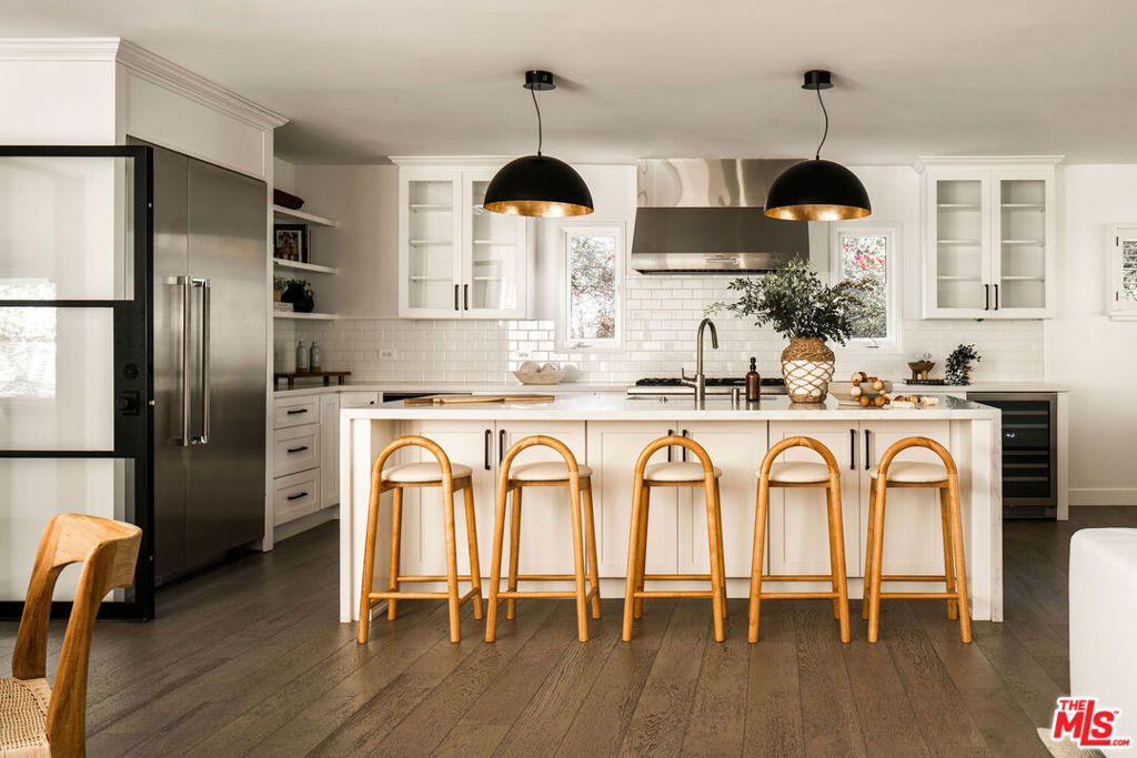 Photo of 12033 Kearsarge Street, Los Angeles, CA 90049 (MLS # 26637887)