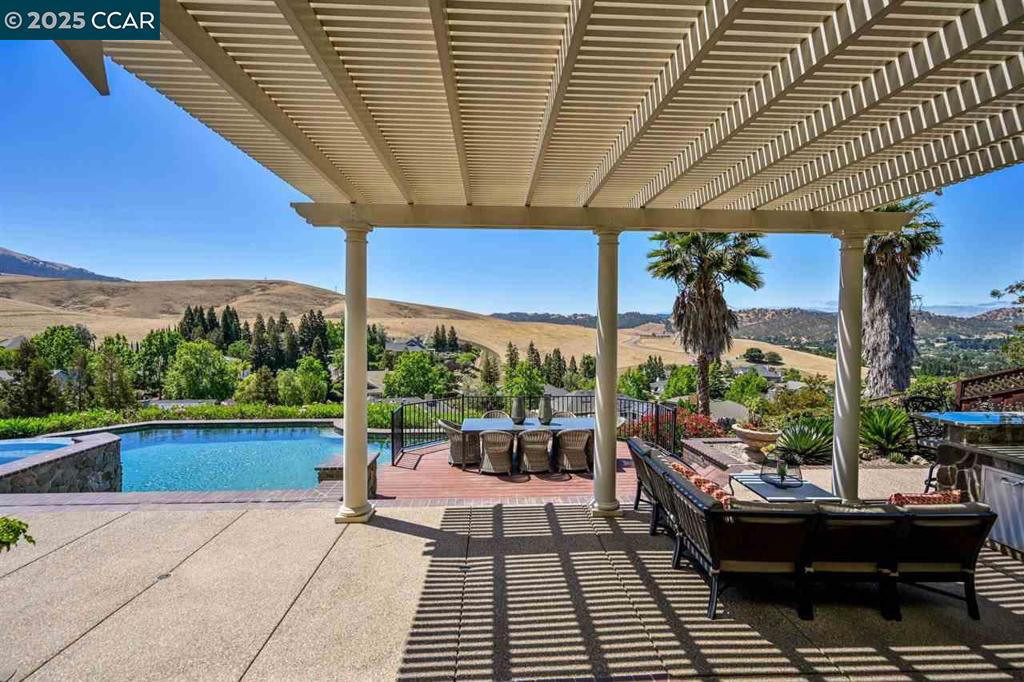 SPECTACULAR PANORAMIC VIEWS IN PRESTIGIOUS RANCHO PARAISO!!! This FABULOUS Harold Smith built home is located on a PREMIER STREET on ONE OF THE BEST VIEW LOTS in sought after RANCHO PARAISO with STUNNING POOL/SPA and SPECTACULAR PANORAMIC VIEWS... Features include dramatic entry with two story ceilings, an impressive family room with fireplace and huge windows with SPECTACULAR PANORAMIC VIEWS, gourmet eat-in kitchen with top of the line appliances, walk-in pantry, Andersen patio doors and VIEWS FOREVER, elegant living and dining rooms with large windows and fireplace, 1ST FLOOR PRIMARY SUITE RETREAT with SPECTACULAR PANORAMIC VIEWS, fireplace, sliding patio doors and luxurious primary bath, 5th bedroom or office on 1st floor with nearby full guest bath, 3 additional bedrooms, large full bath plus an exercise or office space upstairs, and INCREDIBLE ENTERTAINER'S BACKYARD with STUNNING POOL/SPA, outdoor kitchen with BUILT-IN BBQ and seating bar, expansive patios, decks, lawn area, SPECTACULAR PANORAMIC SUNRISE AND SUNSET VIEWS FROM MT. DIABLO TO THE VALLEY and SO MUCH MORE!!! Excellent Northgate Schools, close proximity to Arbolado Park, Shadowbrook Winery, Mt. Diablo, Trails, Boundary Oaks Golf, Whole Foods and Orchard Shopping Centers.