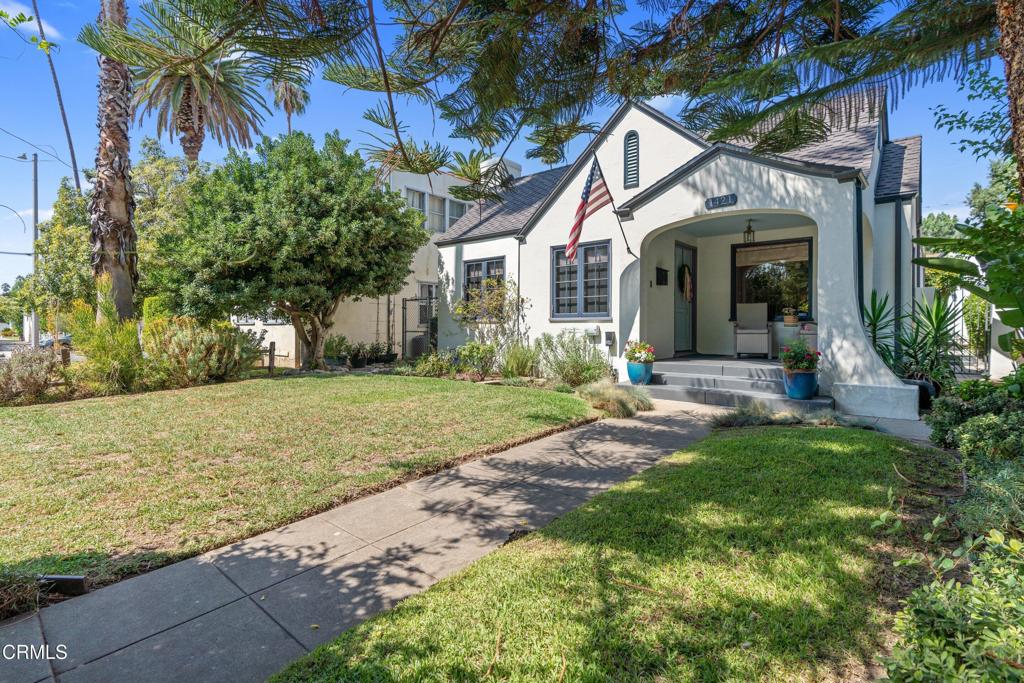 Welcome to 1421 Monte Vista Street, Pasadena, CA, a delightful cottage-style retreat. This inviting 2-bedroom, 1-bathroom home offers 1,128 square feet of living space filled with character and comfort. As you step inside, the warmth of hardwood floors greets you, leading you to a living room adorned with a stunning Batchelder fireplace, perfect for cozy evenings.The spacious formal dining room seamlessly connects to a well-appointed kitchen, featuring built-ins and modern conveniences. The charm continues outside, where a pergola-covered patio invites relaxation or entertaining. The generous backyard includes a versatile casita, an ideal space for an art studio or private office.Enjoy the convenience of a garage and street parking, central heating, and AC for year-round comfort. A washer and dryer in the unit add to the ease of everyday living. Embrace the blend of historic charm and modern amenities in this Pasadena gem. Conveniently located near local shops, restaurants, parks and more!