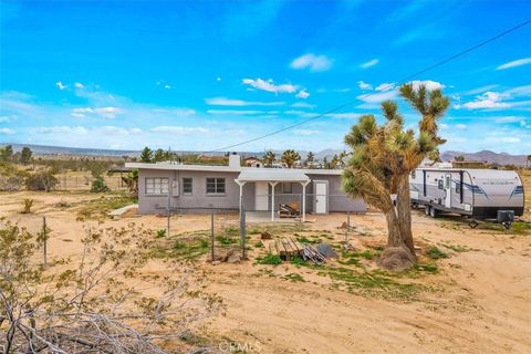 Photo of 57726 Starlight Mesa Road, Yucca Valley, CA 92284 (MLS # JT26070657)
