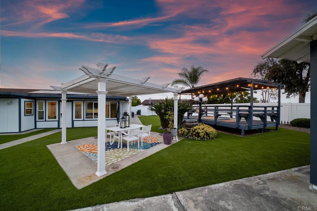 EXCEPTIONAL AND RARE. GORGEOUS HIGHLY UPGRADED 3 BED 2 BATH 1435 SQ FT HOME ON A FULLY LANDSCAPED, FLAT USEABLE 1/3 ACRE LOT IN SOUGHT AFTER RANCHO HERMOSA WITH SOLAR! THIS OPEN CONCEPT HOME IS AN ENTERTAINER'S DREAM. OVER 250K IN UPGRADES. A GOURMET KITCHEN WITH A PANTRY, LARGE DRAWERS, CORNER LAZY SUSAN, WOOD CABINETS, A COUNTER DEPTH FRIG AND WINE/BEVERAGE FRIDGE, ISLAND SEATING, BOSH STOVE AND IT OPENS TO THE LIVING AND DINING ROOMS. LARGE HALL STORAGE CLOSETS WITH PULL-OUTS. THE PRIMARY SUITE IS ROOMY AND INVITING WITH A WALK-IN CLOSET AND BATHROOM UPGRADES.THE 2ND BED IS BEING USED AS AN OFFICE, BUT CAN BE A GUEST ROOM. THE 3RD BR IS HUGE AND IS ACCESSED THROUGH THE SUNROOM WITH WALL TO WALL WINDOWS THAT BRING IN VIEWS OF THE BEAUTIFUL OUTDOOR LIVING AREA. ENTERTAIN OR RELAX IN THIS FULLY FENCED AND LANDSCAPED 1/3 ACRE DREAM YARD WITH ROOM FOR ADU AND/OR JR. ADU. EXPANSIVE TURF, PERGOLA DINING, RAISED AND SHADED VIEW PARTY DECK, 1 WOOD BUILT OUTBUILDING, DRAW YOU OUTSIDE. THE PATH BEYOND BRINGS YOU OUT BY THE BEAUTIFUL FLOWERS, SHRUBS, TREES, AND FRUIT TREES THAT WERE ALL PLANTED WITH CARE AND LEAD TO ADDITIONAL PARTY SEATING AREAS. THIS IS A NEVER SEEN BEFORE 55+ HOME. RECESSED LIGHTING, CEILING FANS, SKYLIGHTS, DUAL PANE WINDOWS, PLANTATION SHUTTERS, LVP FLOORING, PEX REPIPE, 3 CAR DRIVEWAY, AND 500 FT OF VINYL FENCING. YOU WILL HAVE TO SEE IT TO BELIEVE IT.