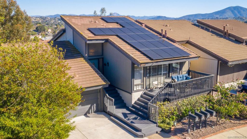 Don't miss out on this investment property located in the highly sought-after hills above La Mesa Village! This exceptional modern Twinhome, lives like a single-family home & has breathtaking panoramic views of Mt. Helix. Featuring high-end upgrades throughout & 20 ft vaulted ceilings, & an open-concept design that seamlessly blends indoor & outdoor living. Comes with high-end fully furnishings & has solar! The lower level is a granny suite with a full kitchen and full bathroom. Currently Rented at $6200/mo, perfect for investors. Enjoy multiple decks, a private yard, & a relaxing hot tub. 2-car garage w/ closets & vaulted ceiling for maximum storage. Ideally located within walking distance to La Mesa Village, with easy access to the 8, 94, & 125 freeways, just about 15 minutes to downtown San Diego!